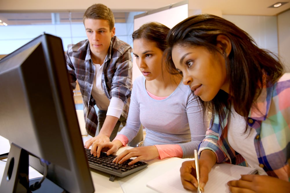Group of students working in computer lab Group of students working in computer lab
